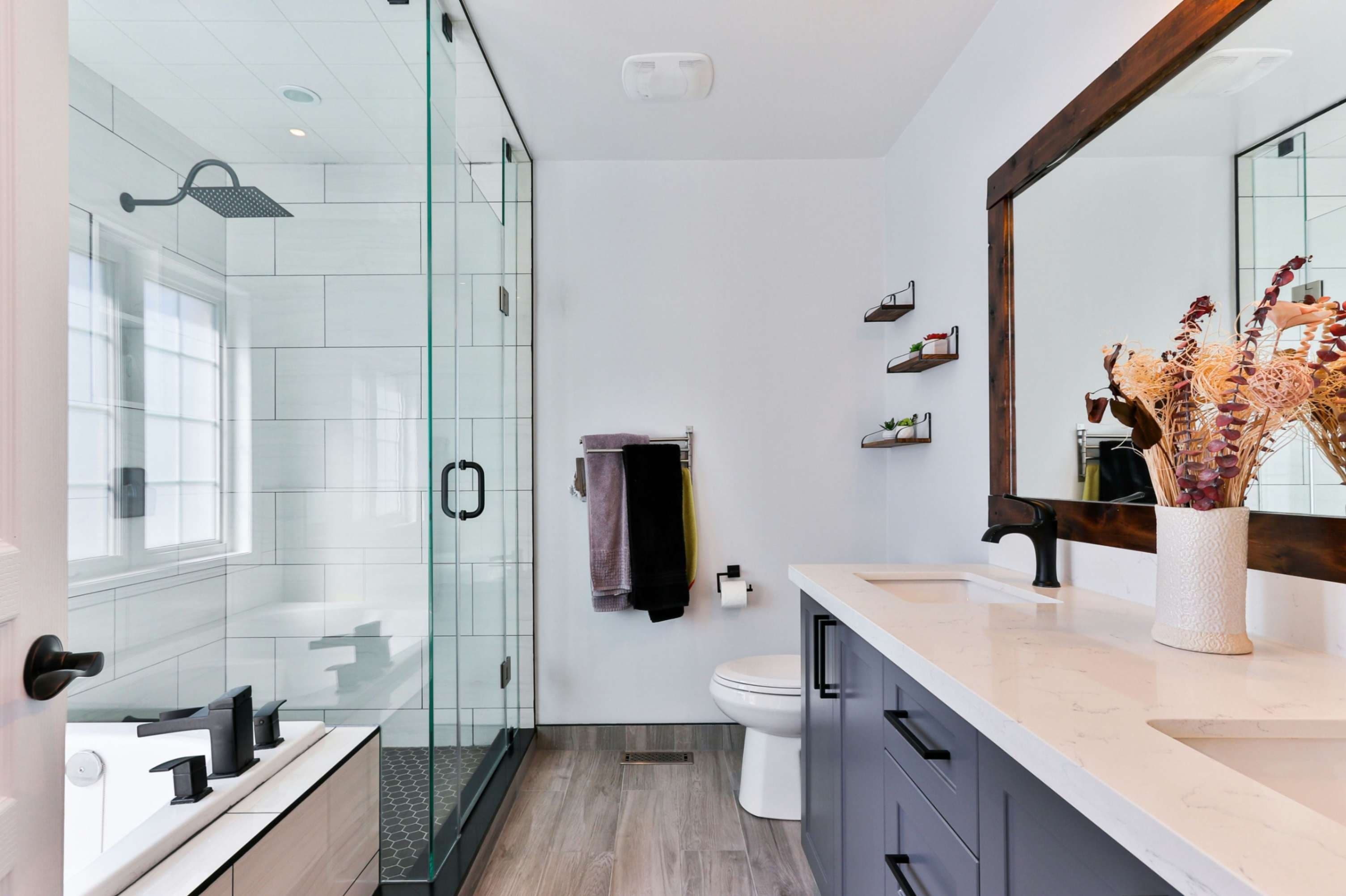 High-end spa-inspired bathroom transformation featuring standalone bathtub